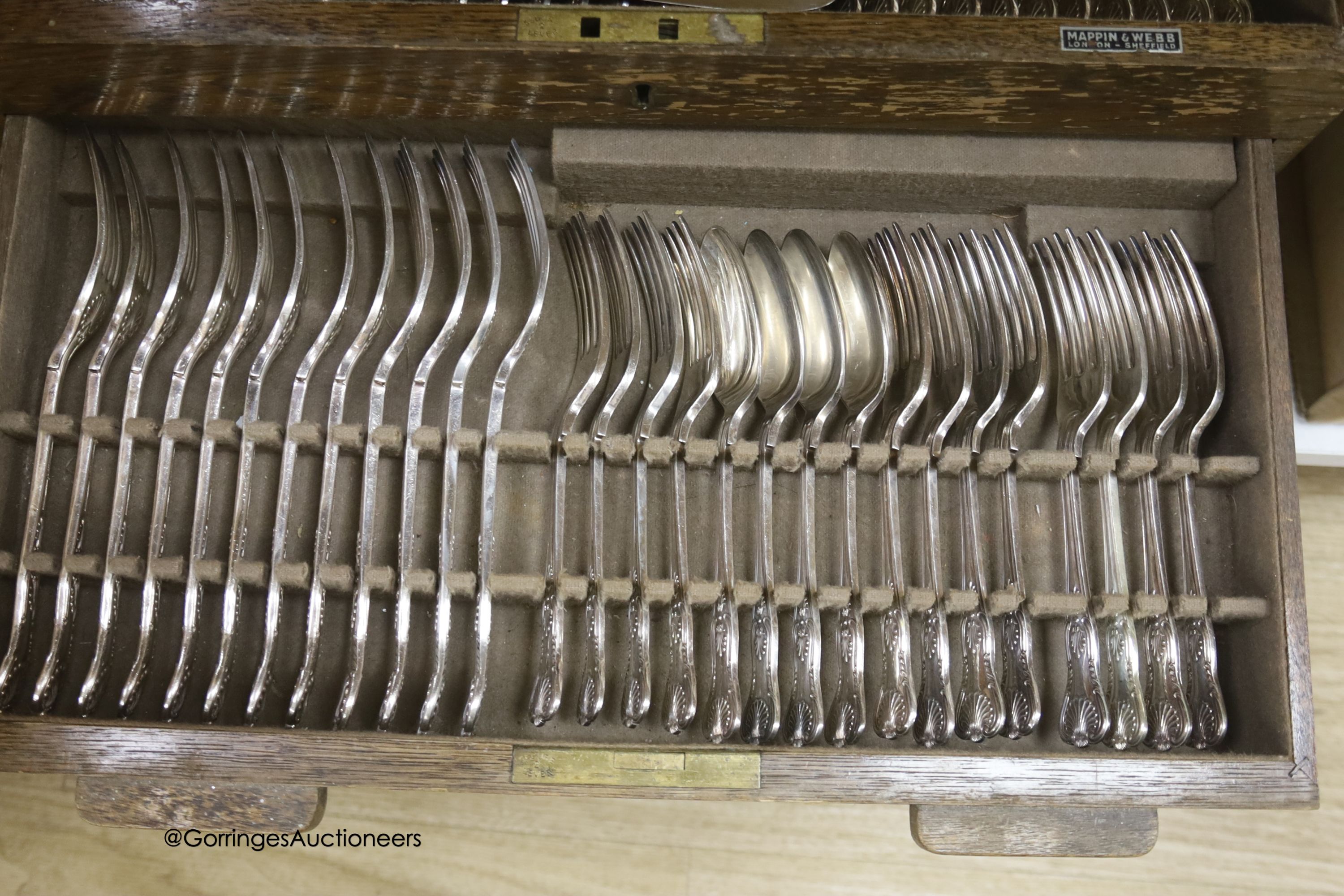 A Mappin and Webb canteen of silver plated Kings pattern cutlery, twelve place setting